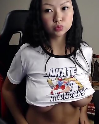 Asian babe shows her perfect tits