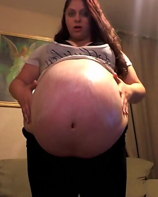 ample pregnant gal in Tight Clothes